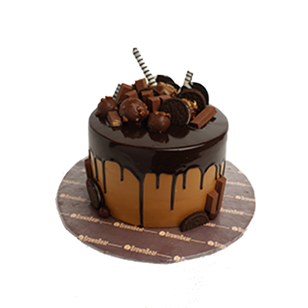 chocolate cake with toppings oreo kitkat smarties m&m birthday Stock Photo  | Adobe Stock